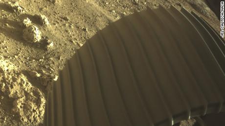 Rocks spotted by the rover have holes in them -- which has the scientists curious to see what would cause them. 