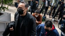 Dozens of Hong Kong former lawmakers charged under national security law