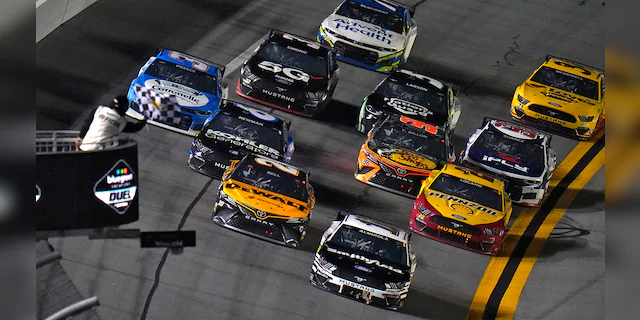 Aric Almirola (10) beats Christopher Bell (20), Ryan Newman (6) and Joey Logano (22) to the finish line to win the first NASCAR Daytona 500 duel qualifying auto race.