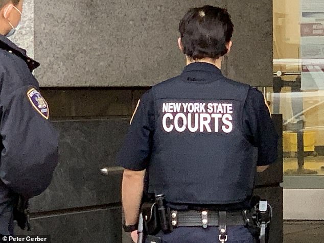 New York State Court officers are pictures standing outside the court building on Monday