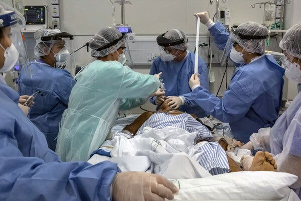 A patient is intubated at Hospital Clínicas, a main medical facility in central Porto Alegre, Brazil. 