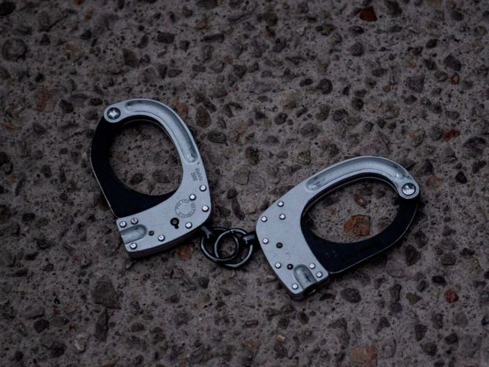 handcuffs on ground