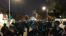 Crackdown at Echo Park homeless encampment begins as LAPD moves in, clashes with protesters