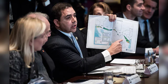 Rep. Henry Cuellar, D-Texas, hold up a border map as he speaks during a meeting with lawmakers on immigration policy in the Cabinet Room at the White House in Washington, D.C., on Tuesday, Jan. 9, 2018. (Photo by Jabin Botsford/The Washington Post via Getty Images)