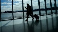 A person walks through LaGuardia Airport in New York, on March 6.