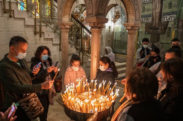 Christian worshipers at the Church of the Holy Sepulcher, during a Good Friday procession in Jerusalem.
