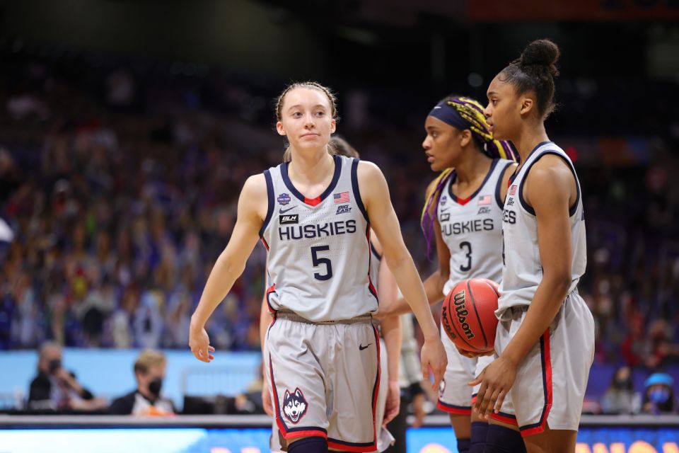 UConn&#39;s Paige Bueckers (left) reacts during her team&#39;s loss to the Arizona Wildcats in the Final Four of the 2021 NCAA women&#39;s basketball tournament on April 02. (Carmen Mandato/Getty Images)