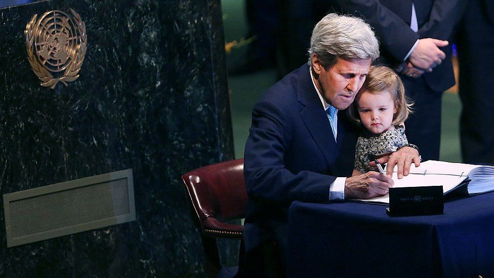 John Kerry signs the Paris accord in 2016