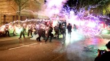 Portland police declare riot as marchers break windows on anniversary of George Floyd’s murder