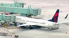Delta Air Lines: A passenger tried to breach the cockpit of a flight to Nashville, forcing the plane to make an emergency landing