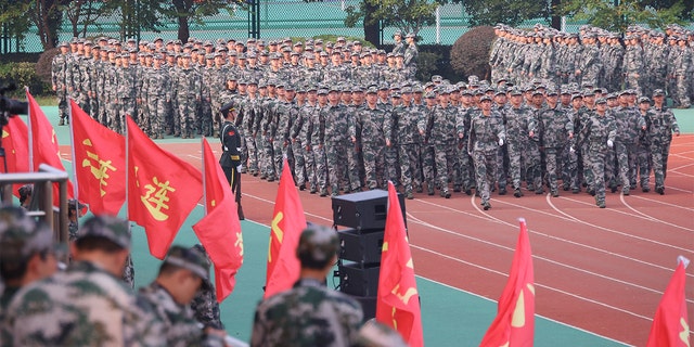 Freshmen take part in a military training at Southeast University Oct. 22, 2021, in Nanjing, Jiangsu Province of China. 