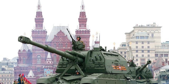 Russian 2S35 Koalitsiya-SV self-propelled howitzers roll toward Red Square during the Victory Day military parade in Moscow, May 9, 2021, marking the 76th anniversary of the end of World War II in Europe. 