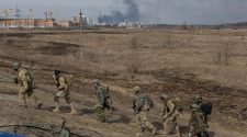 Russian forces advance in eastern Ukraine, strike military base in west -reports