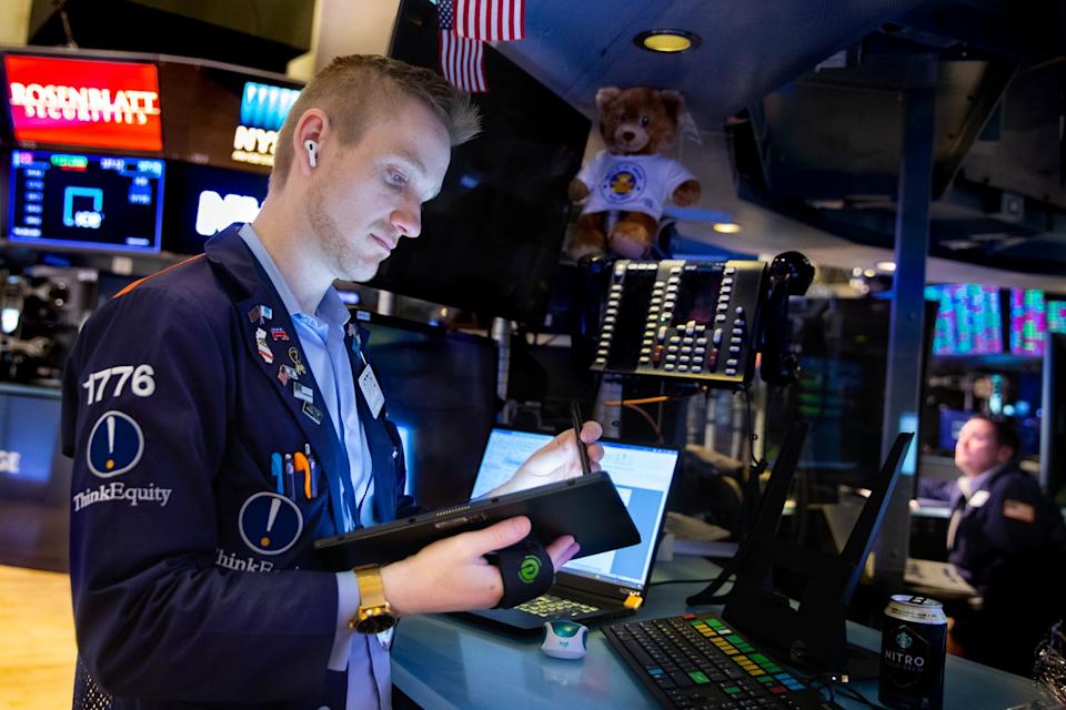 A trader works at the New York Stock Exchange in New York, the United States, Feb. 28, 2022. U.S. stocks closed mixed on Monday as investor eyed updates regarding the Russia-Ukraine conflict.The Dow Jones Industrial Average fell 166.15 points, or 0.49 percent, to 33,892.60. The S&P 500 decreased 10.71 points, or 0.24 percent, to 4,373.94. The Nasdaq Composite Index rose 56.78 points, or 0.41 percent, to 13,751.40. (Allie Joseph/NYSE/Handout via Xinhua)