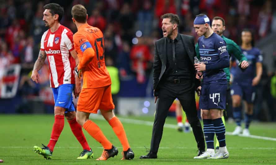 An irate Diego Simeone shouts at Stefan Savic (left).