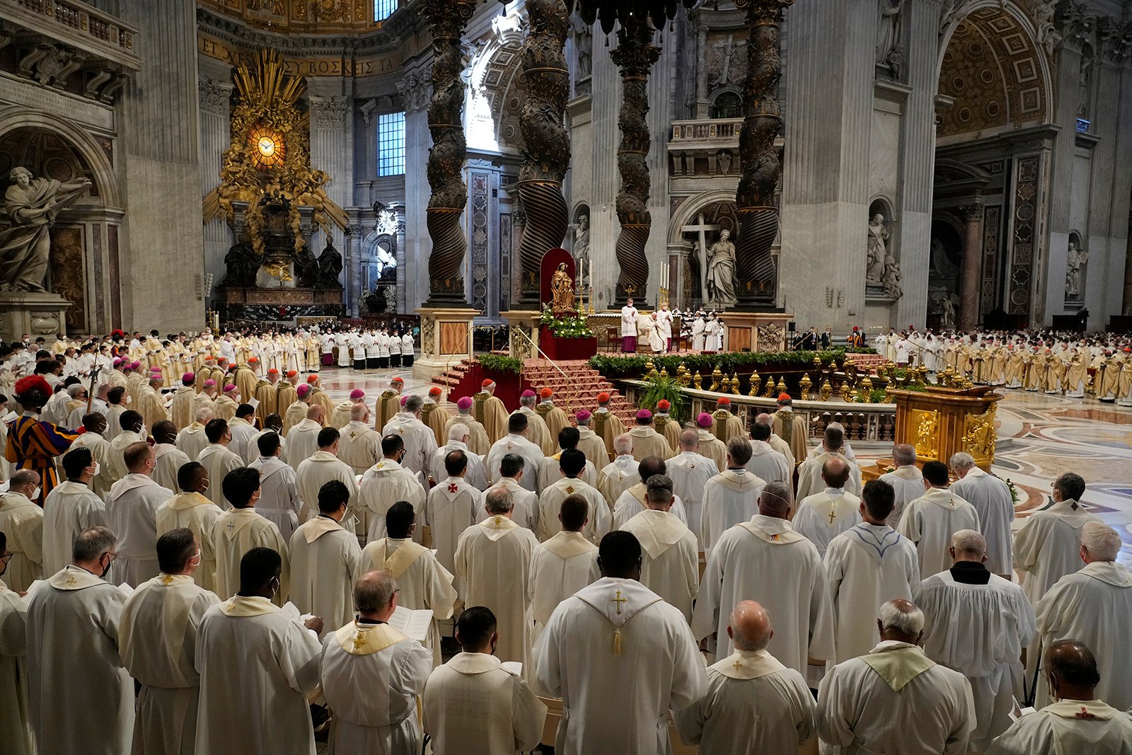 Pope Francis presides over a Chrism Mass inside St. Peter's Basilica, at the Vatican, Thursday, April 14, 2022. During the Mass the Pontiff blesses a token amount of oil that will be used to administer the sacraments for the year. (AP Photo/Gregorio Borgia)