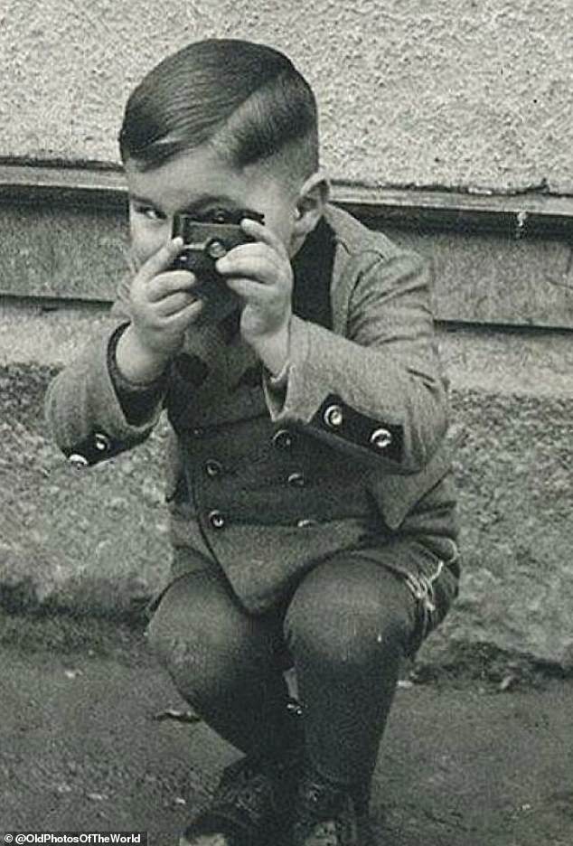 In another snap, one Bavarian boy enjoyed playing with his camera which was known as a Sida and was made in Berlin. Production started in 1936.
