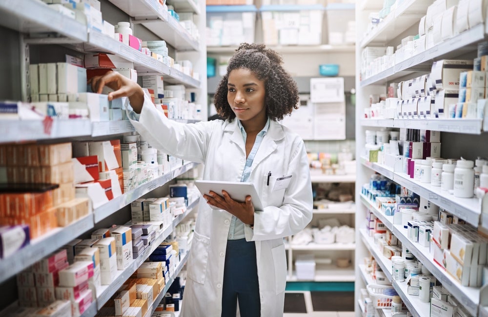 pharmacist checking drugs