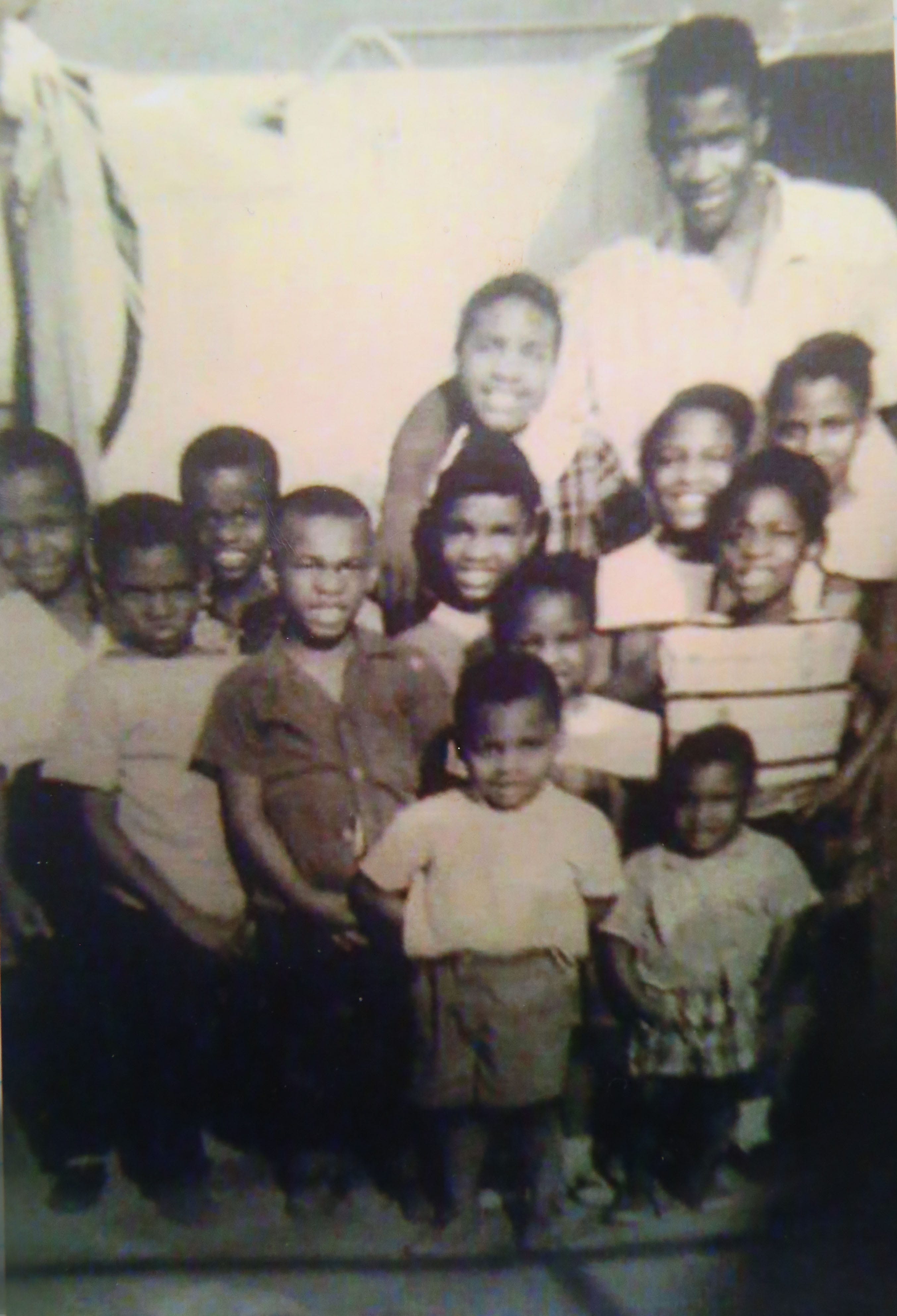 Elijah Edwards, second from left, with his 12 other siblings in this 1960’s family photo.