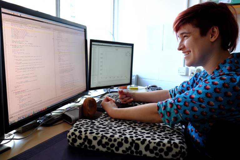 Portrait of Claire Malone working at a computer
